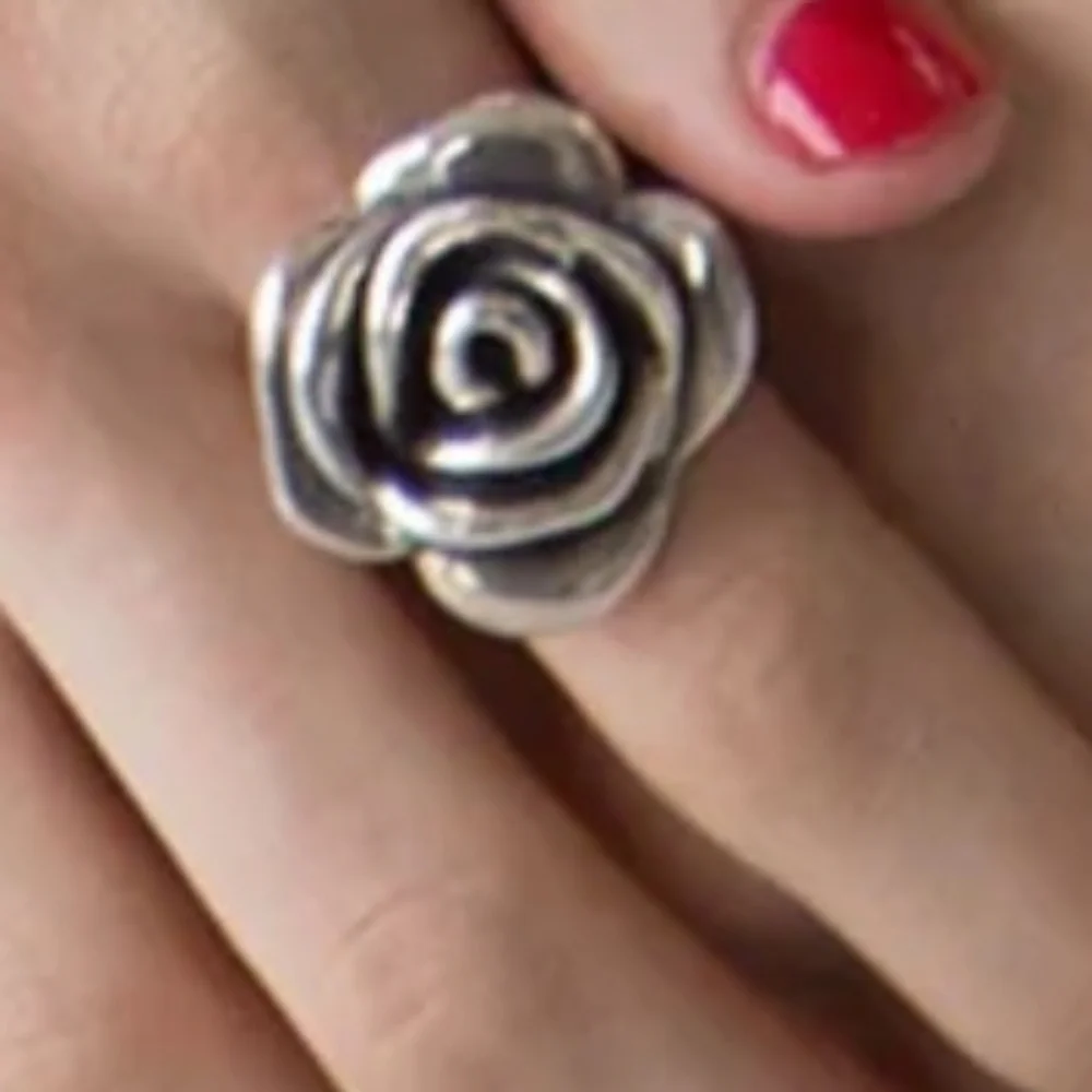 Sterling silver rose ring.